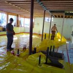 Installation of Underfloor Insulation and Moisture Barrier